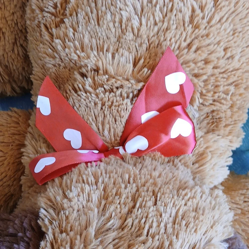 Big Fluff Soft Plush Dog Toy with Red Bow